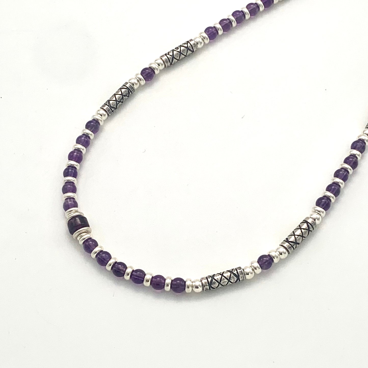 Etched Silver and Amethyst Necklace by Anne Farag.