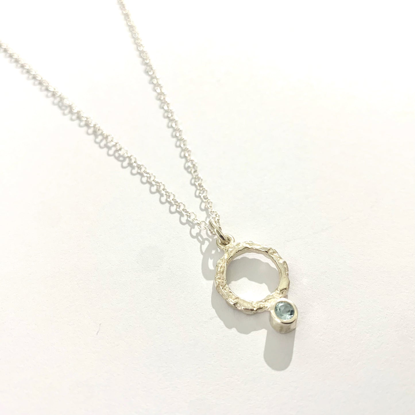 Blue Topaz and Silver Pendant