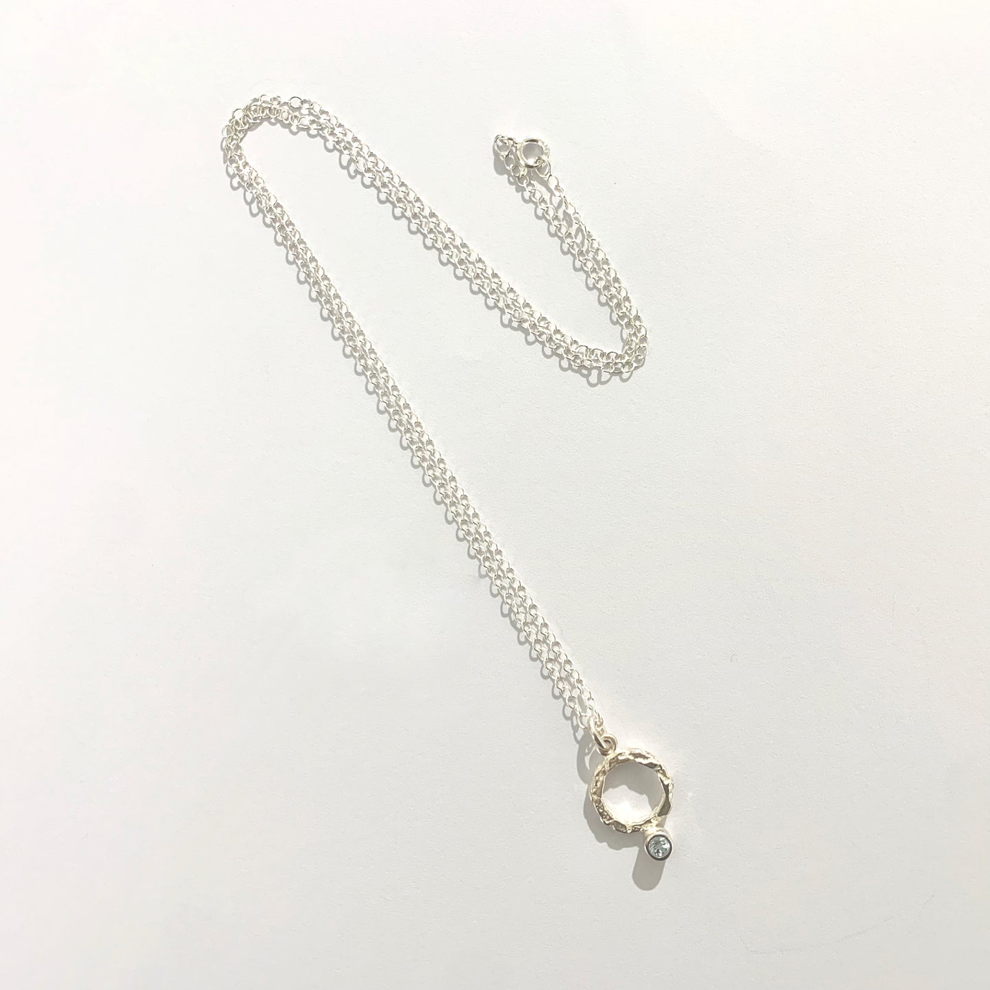 Blue Topaz and Silver Pendant