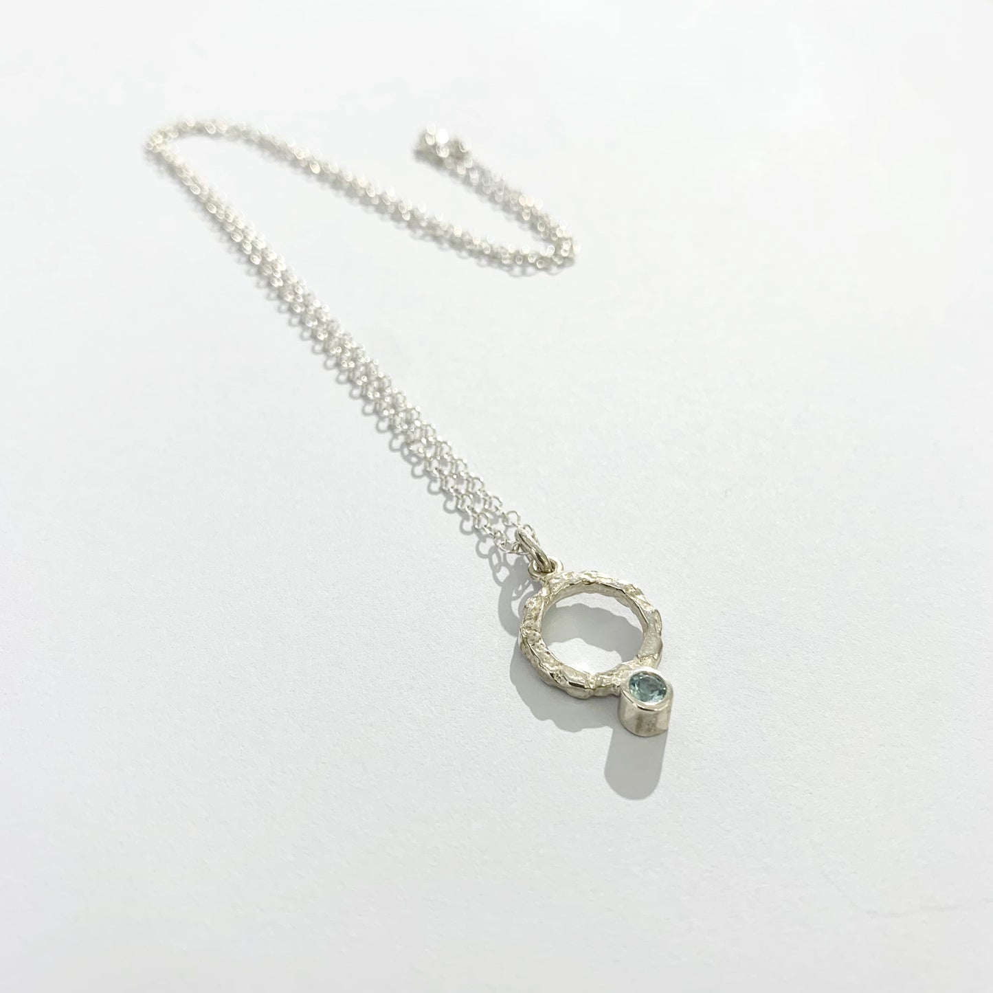 Blue Topaz and Silver Pendant